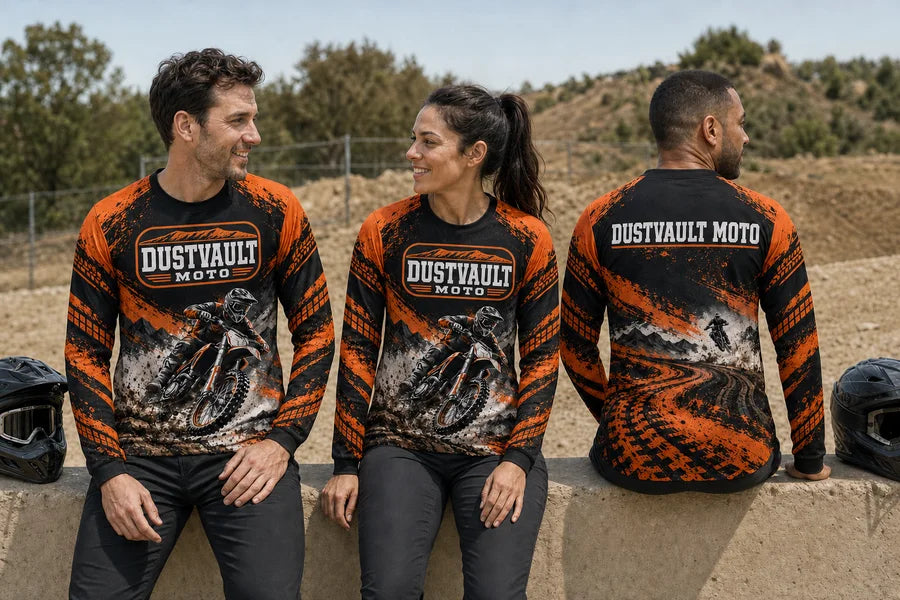 DUSTVAULT MOTO team wearing Dustline Charge shirts. Pit-wall rest.