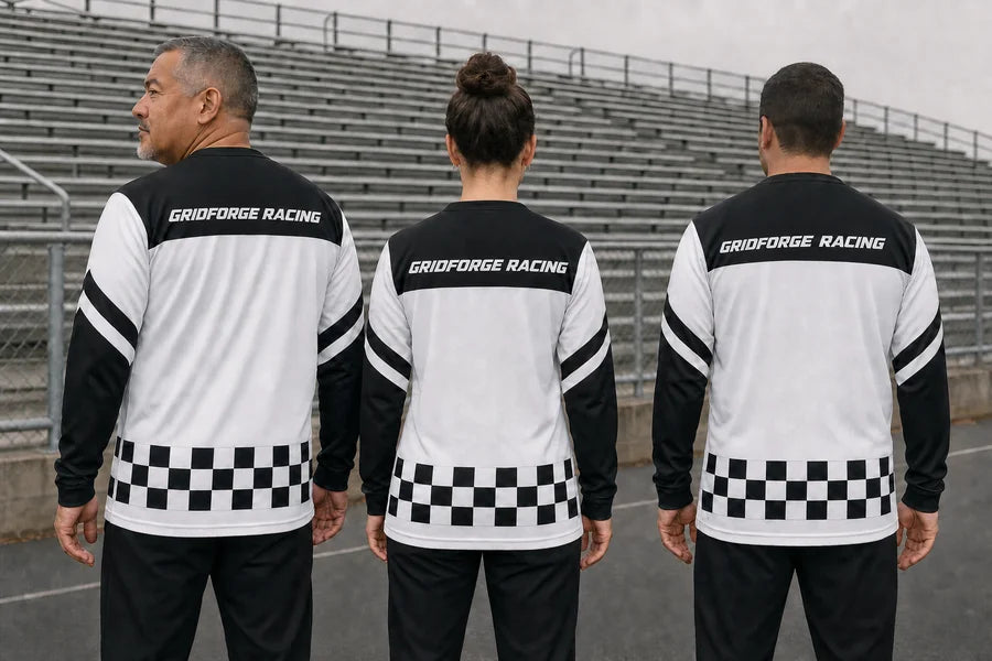 GRIDFORGE RACING team wearing Mono Finish Stripe shirts. Empty-bleacher pause.